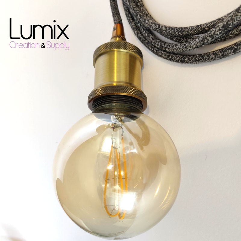 Lampe Fiat Lux à partir d'un socle de dameuse, griffes de lustre, tête en  verre, douille laiton, ampoule Edison