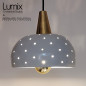 Suspension céramique Starlight noir ou blanche finition laiton