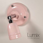 Lampe applique murale orientable en porcelaine rose pastel et métal chromé