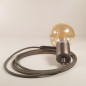Lampe à suspendre type baladeuse porte-douille métal lisse Inox satinée - Câble textile Gris effet soie Lampe à suspendre type baladeuse porte-douille métal lisse Inox satinée - Câble textile Gris effet soie