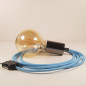 Lampe à suspendre type baladeuse porte-douille métal lisse Perle noire de Tahiti - Câble textile Bleu Azur effet soie Lampe à suspendre type baladeuse porte-douille métal lisse Perle noire de Tahiti - Câble textile Bleu Azur effet soie